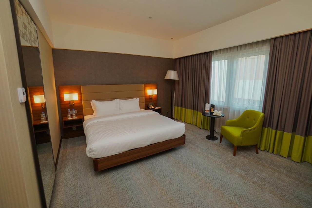 The Grand Lux Hotel Доха Екстериор снимка